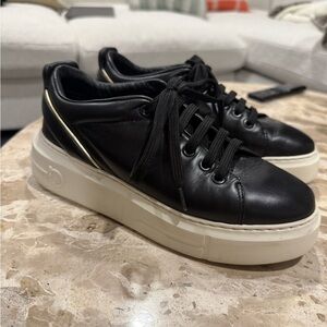 Black Leather Sneakers with Gold Accents